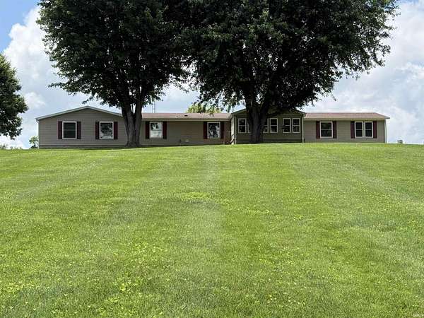 5.76 Acres of Land with Home for Sale in Heltonville, Indiana