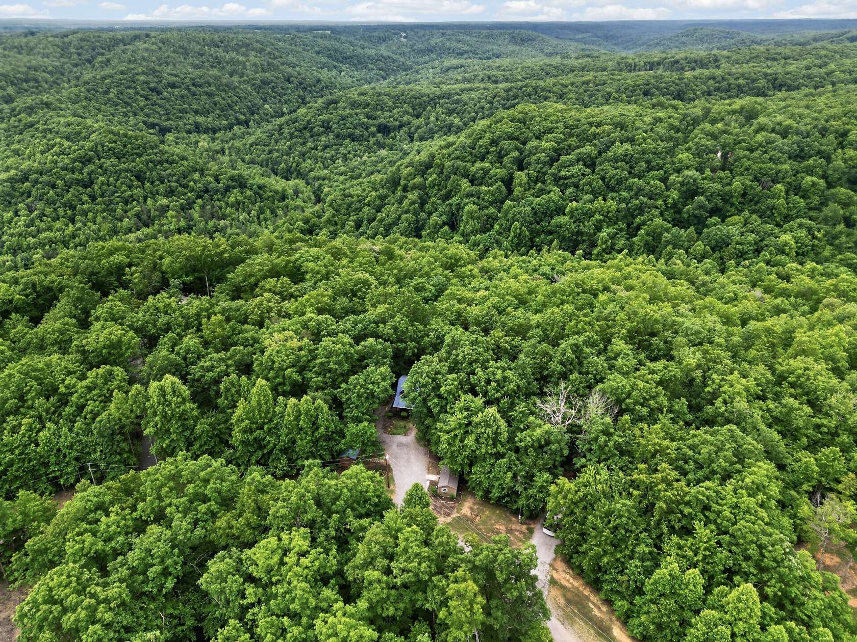 6.75 Acres of Land with Home for Sale in Crawford, Tennessee