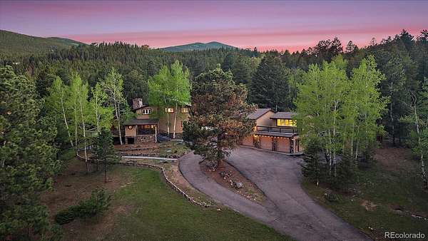 8 Acres of Land with Home for Sale in Evergreen, Colorado