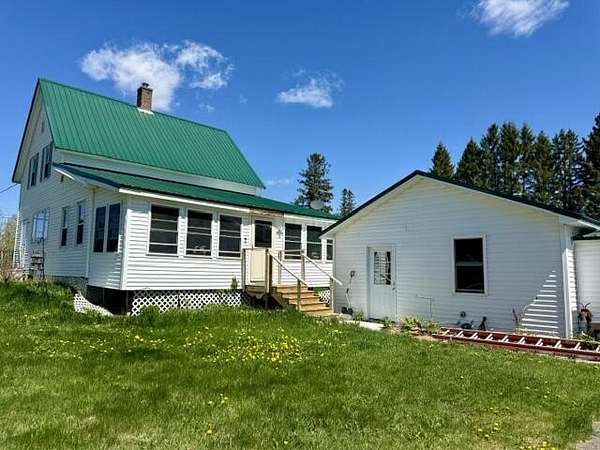 1.5 Acres of Land with Home for Sale in Caribou, Maine