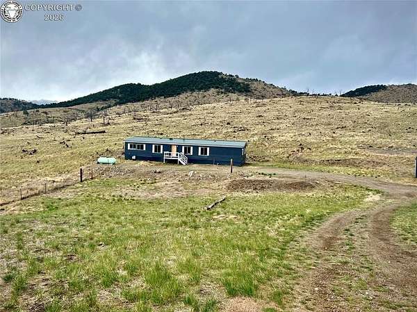 2 Acres of Land with Home for Sale in Cotopaxi, Colorado