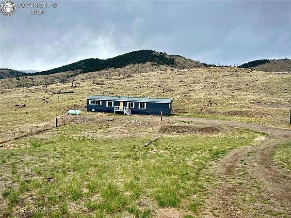 2 Acres of Land with Home for Sale in Cotopaxi, Colorado