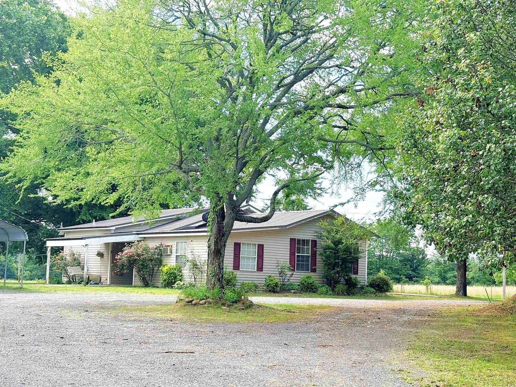 8.1 Acres of Land with Home for Sale in Greenbrier, Arkansas