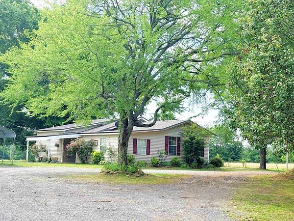 8.1 Acres of Land with Home for Sale in Greenbrier, Arkansas