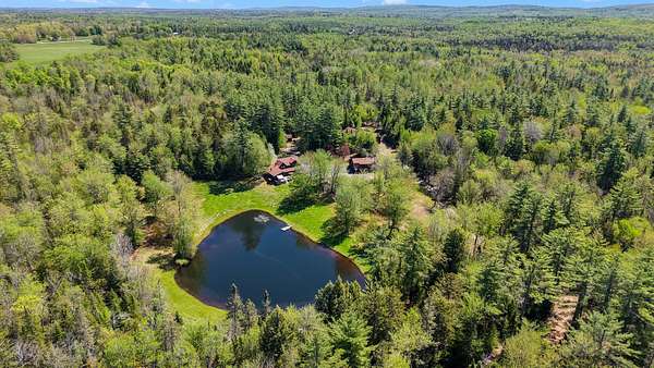 12 Acres of Land with Home for Sale in Sangerville, Maine