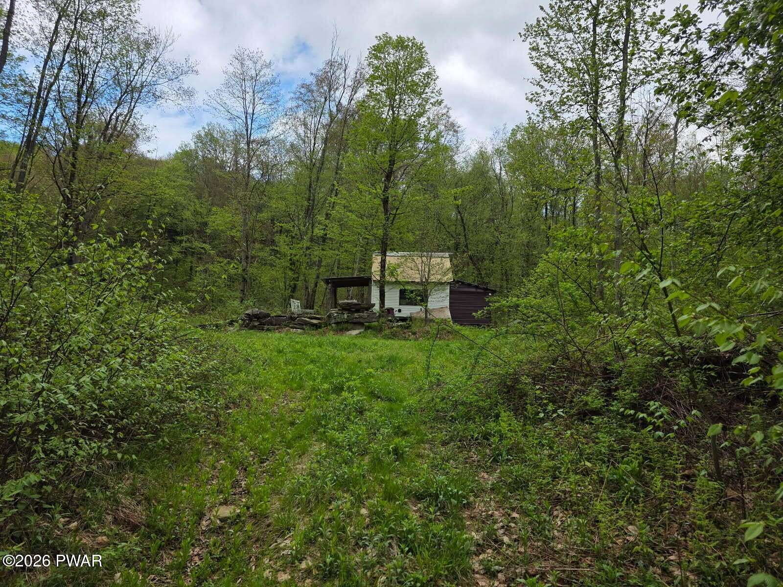 58 Acres of Recreational Land with Home for Sale in Susquehanna, Pennsylvania