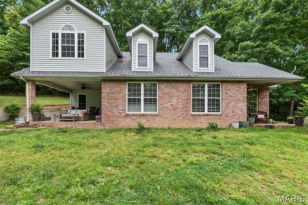1.55 Acres of Land with Home for Sale in Jackson, Missouri