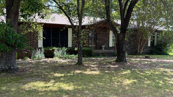 32 Acres of Land with Home for Auction in Clarksville, Arkansas