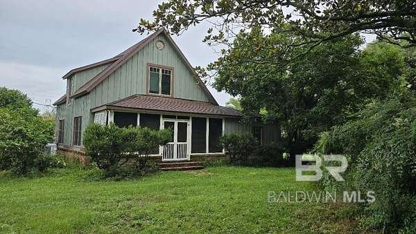 5.5 Acres of Land with Home for Sale in Loxley, Alabama
