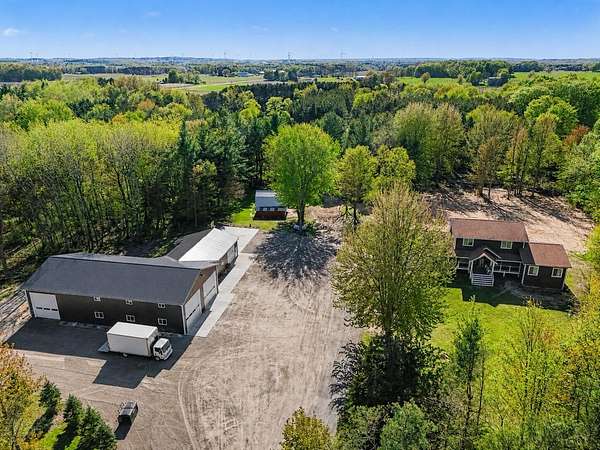 20 Acres of Recreational Land with Home for Sale in Scottville, Michigan