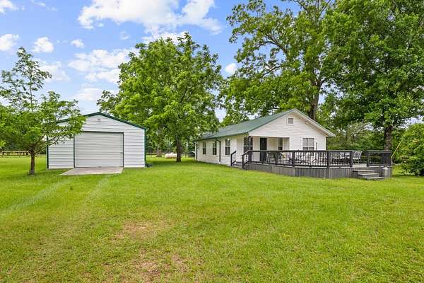 18.4 Acres of Land with Home for Sale in New Waverly, Texas