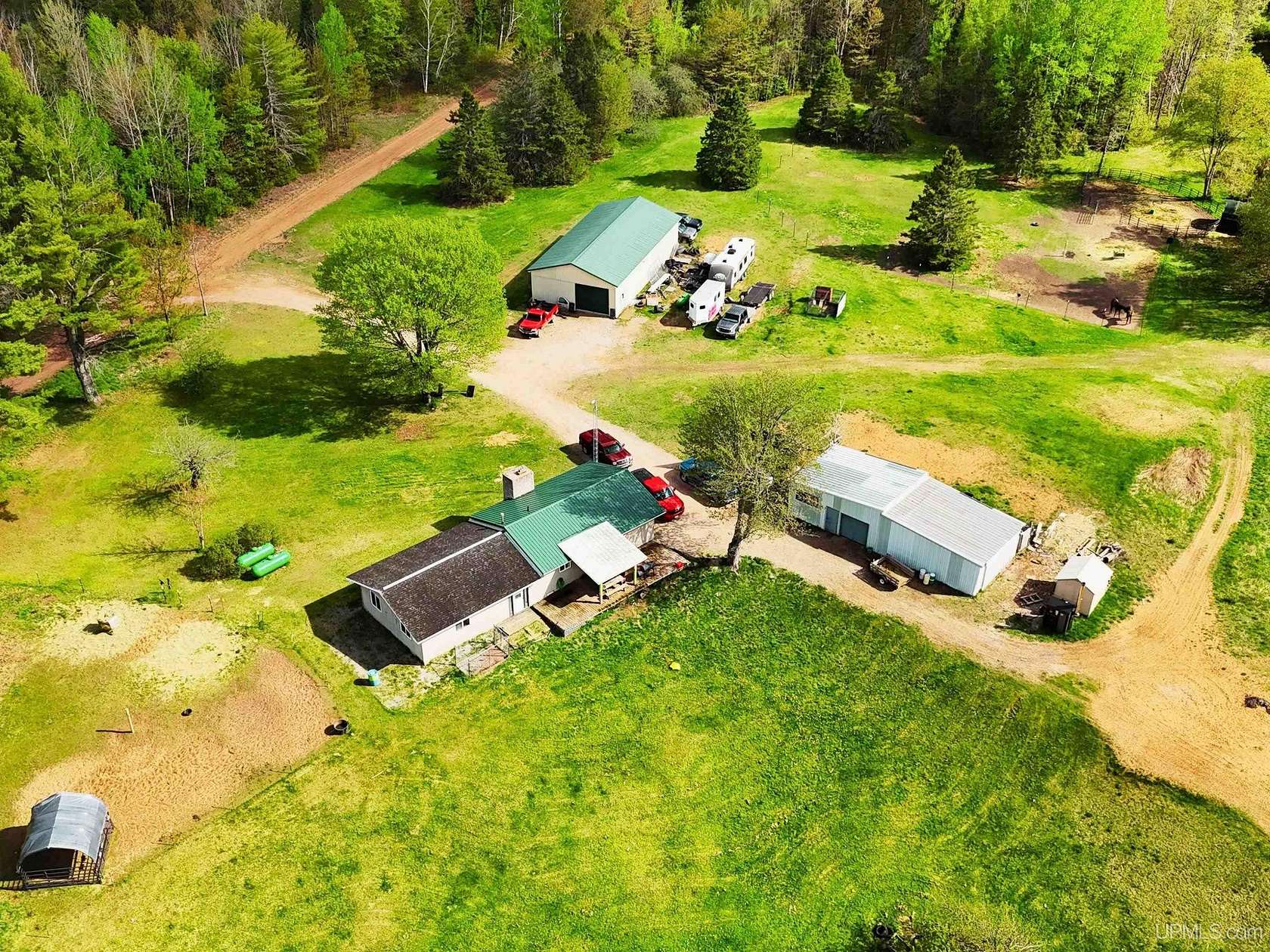 320 Acres of Land with Home for Sale in Rock, Michigan