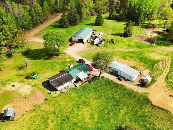 320 Acres of Land with Home for Sale in Rock, Michigan