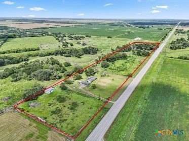 15.5 Acres of Land with Home for Sale in Louise, Texas