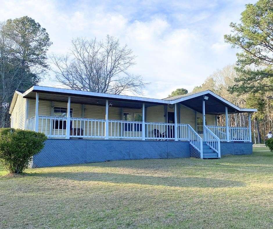 7 Acres of Land with Home for Sale in Laurel, Mississippi