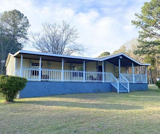 7 Acres of Land with Home for Sale in Laurel, Mississippi