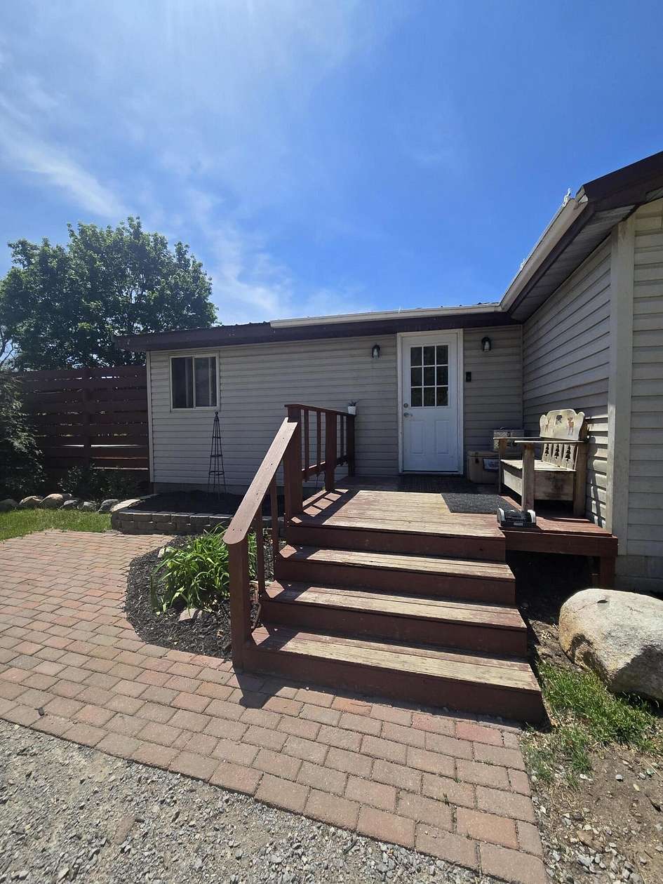 3.5 Acres of Land with Home for Sale in Evart, Michigan