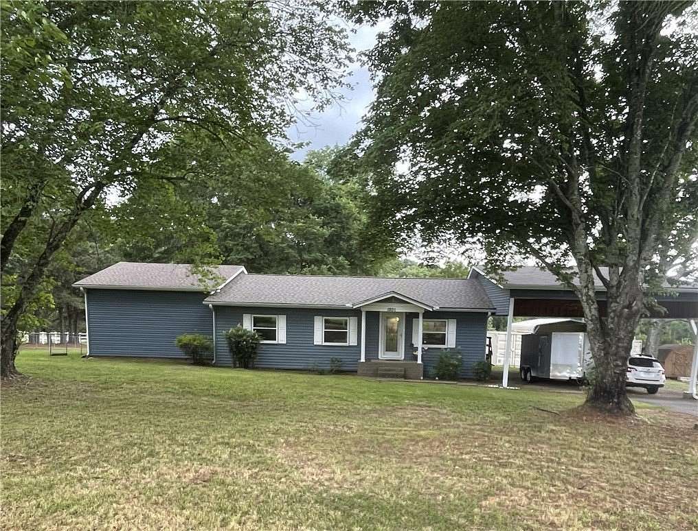 3.55 Acres of Land with Home for Sale in Clarksville, Arkansas