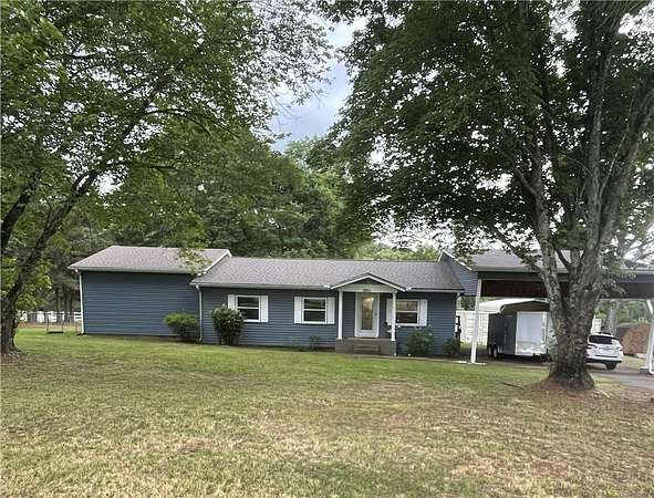 3.55 Acres of Land with Home for Sale in Clarksville, Arkansas