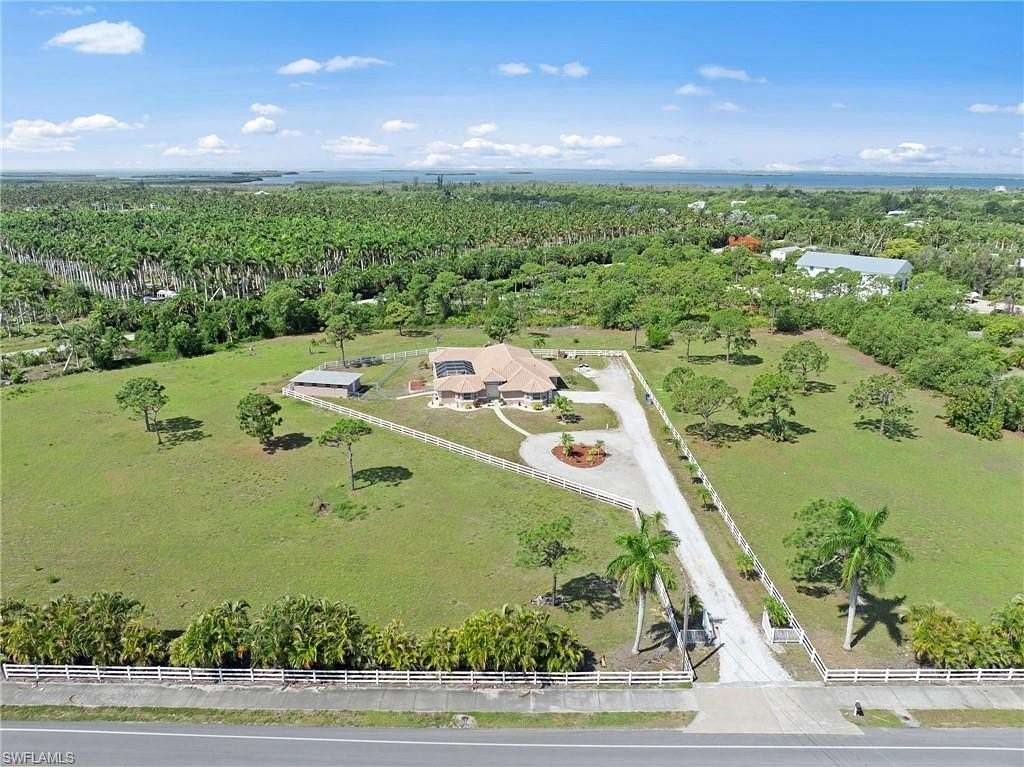 5.9 Acres of Land with Home for Sale in Bokeelia, Florida