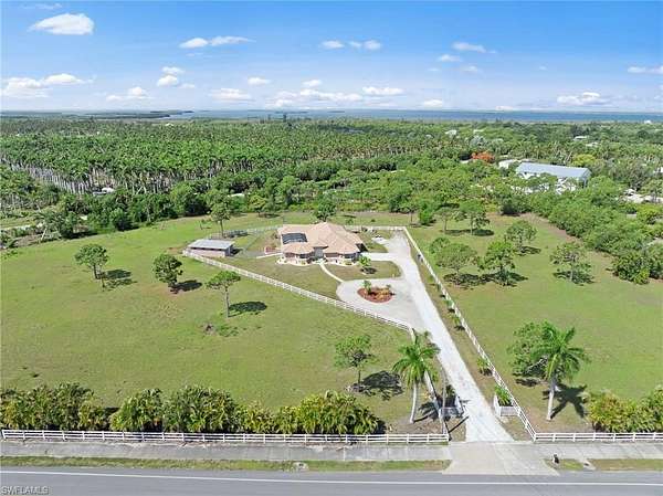 5.9 Acres of Land with Home for Sale in Bokeelia, Florida