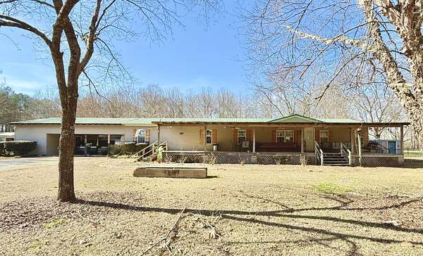 16 Acres of Land with Home for Sale in Caledonia, Mississippi