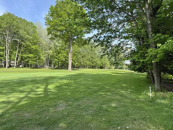 0.76 Acres of Residential Land for Sale in Canadian Lakes, Michigan