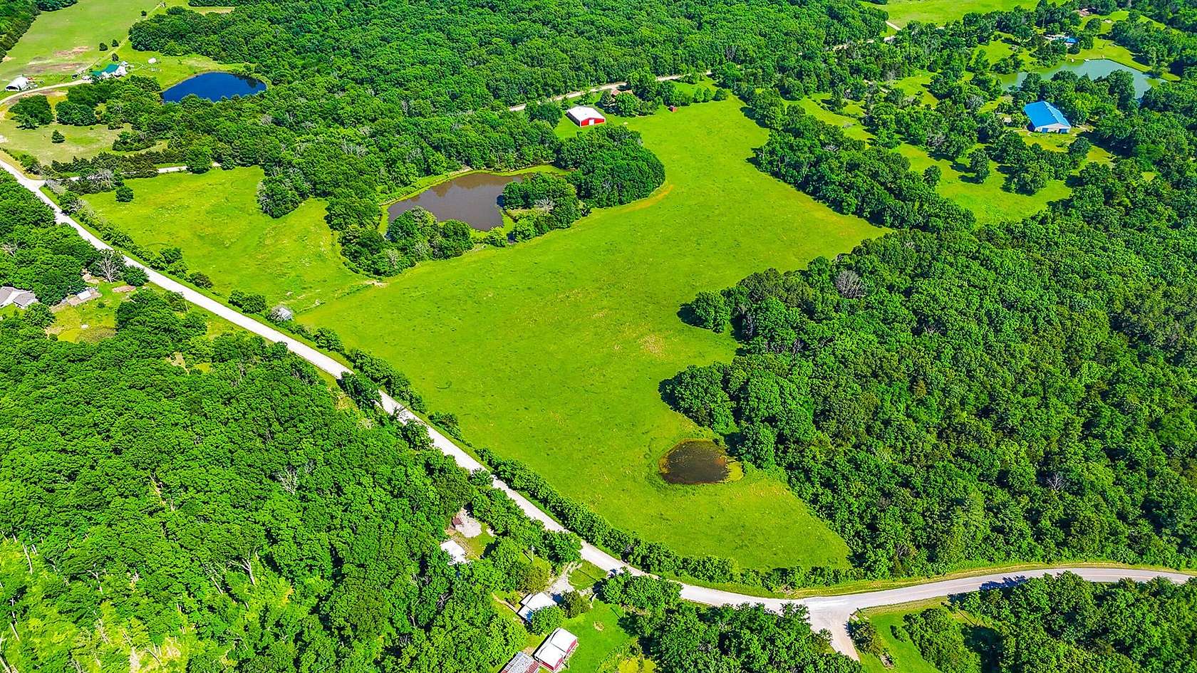 46.4 Acres of Land with Home for Sale in Clark, Missouri