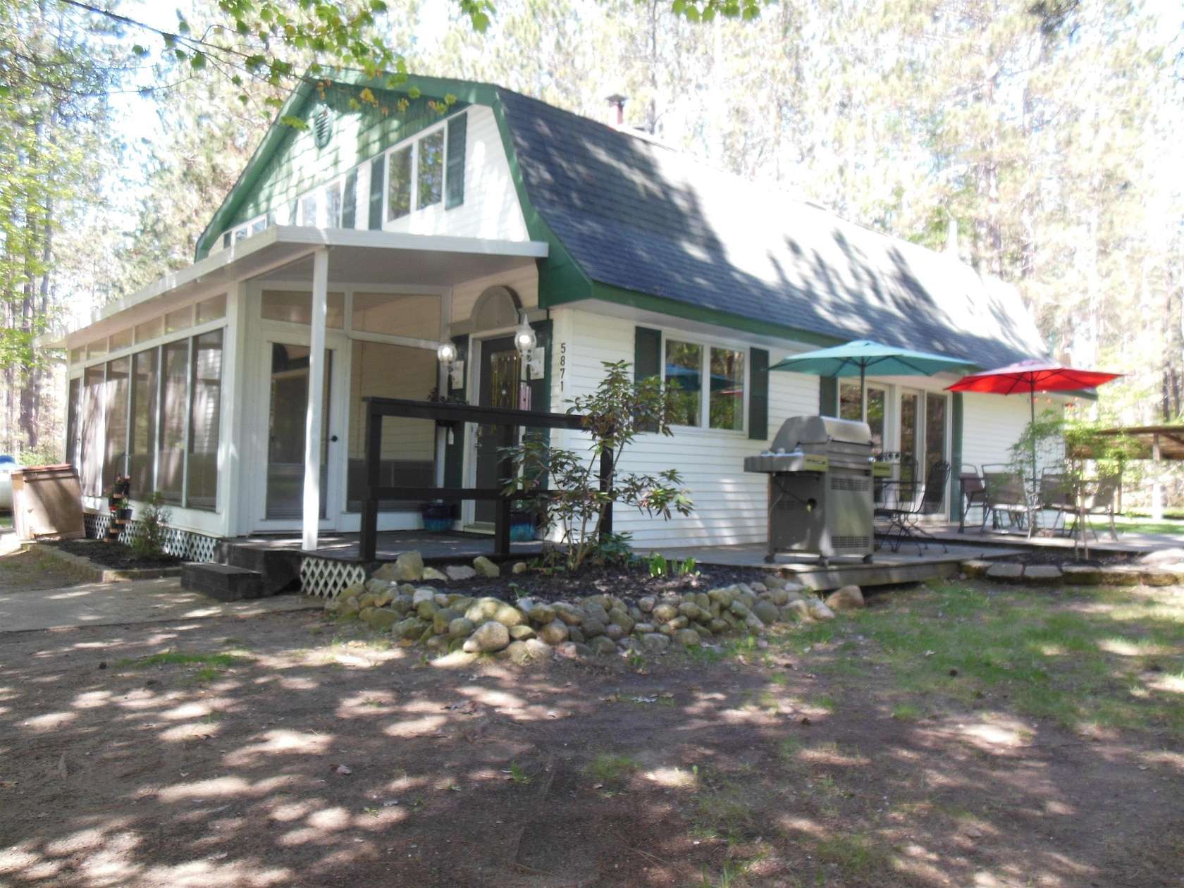 9.45 Acres of Land with Home for Sale in Harrison, Michigan
