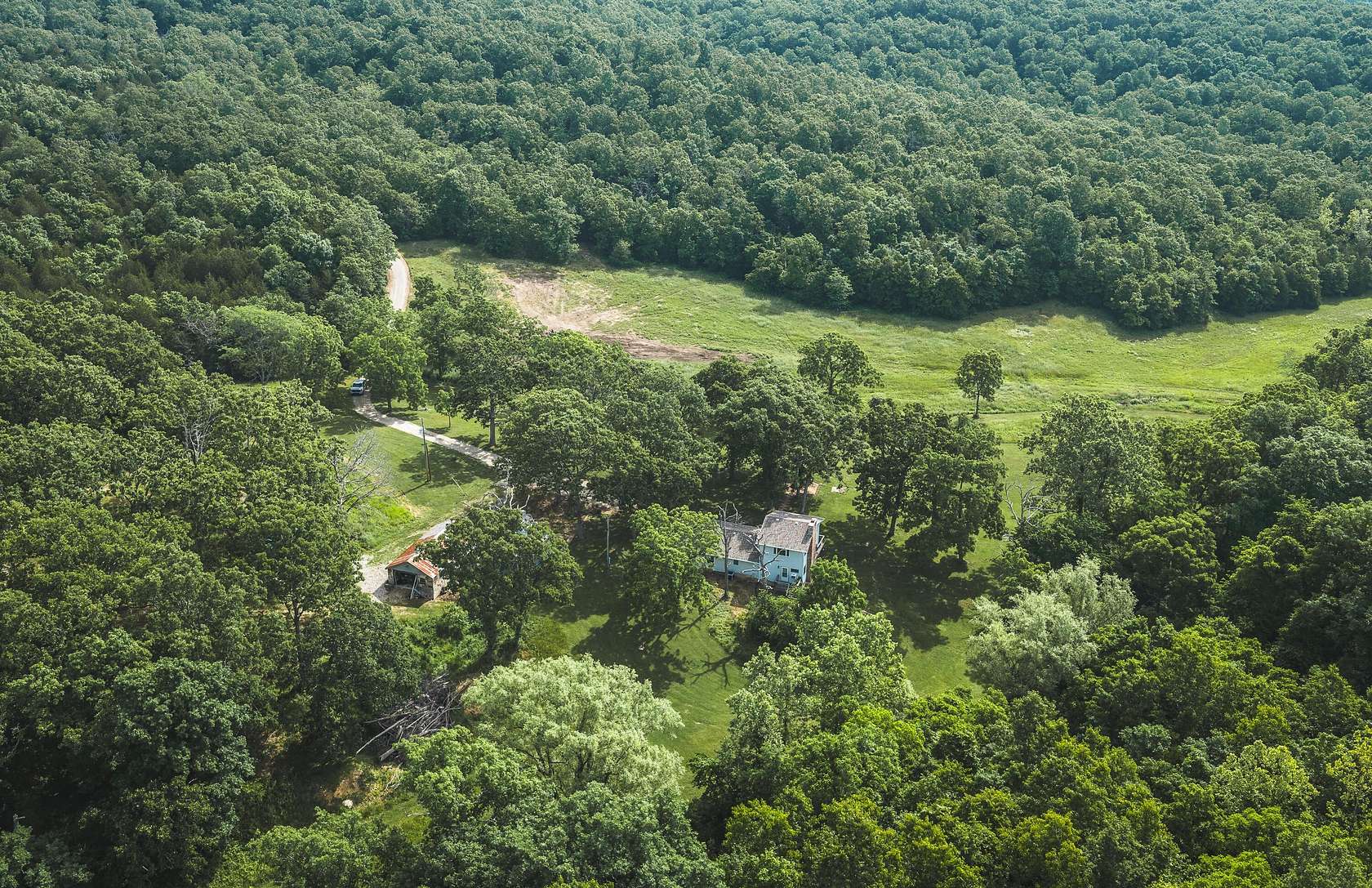 158 Acres of Recreational Land with Home for Sale in Falcon, Missouri