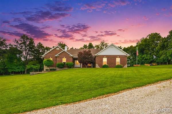 2.33 Acres of Land with Home for Sale in Hawk Point, Missouri