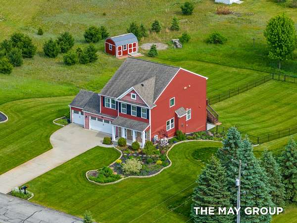 2 Acres of Land with Home for Sale in Alto, Michigan