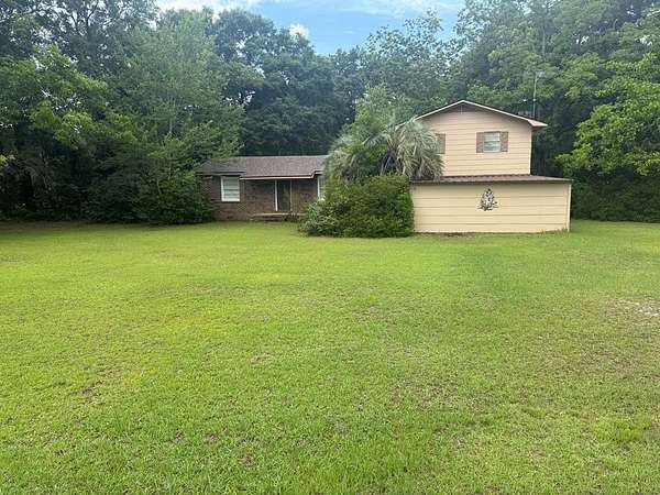 6.6 Acres of Land with Home for Sale in Hartford, Alabama