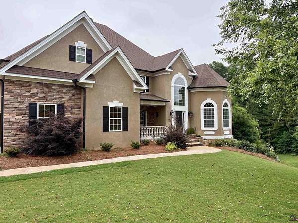 1.63 Acres of Land with Home for Sale in Forsyth, Georgia