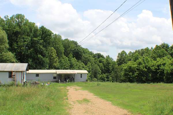7.2 Acres of Land with Home for Sale in Millington, Tennessee