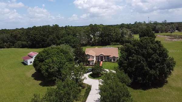 5.25 Acres of Land with Home for Sale in Sorrento, Florida
