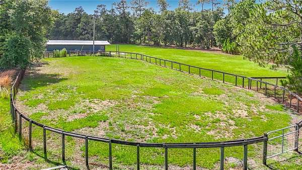 9.73 Acres of Land with Home for Sale in Wesley Chapel, Florida
