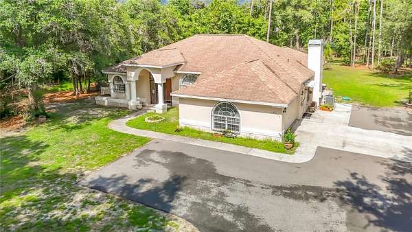 9.73 Acres of Land with Home for Sale in Wesley Chapel, Florida