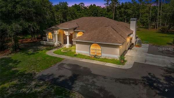 9.73 Acres of Land with Home for Sale in Wesley Chapel, Florida