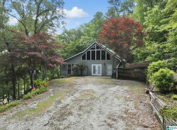 1.85 Acres of Land with Home for Sale in Delta, Alabama