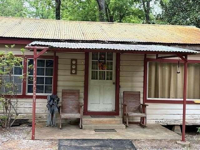 6.69 Acres of Land with Home for Sale in Buckner, Arkansas