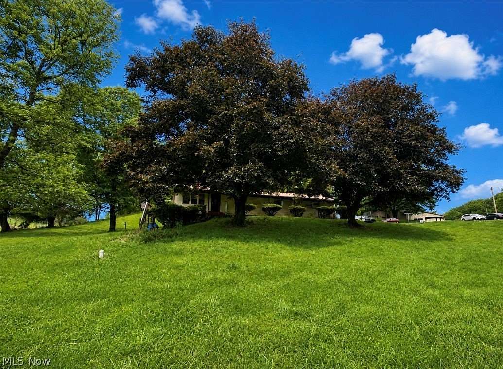 6 Acres of Land with Home for Sale in Cambridge, Ohio