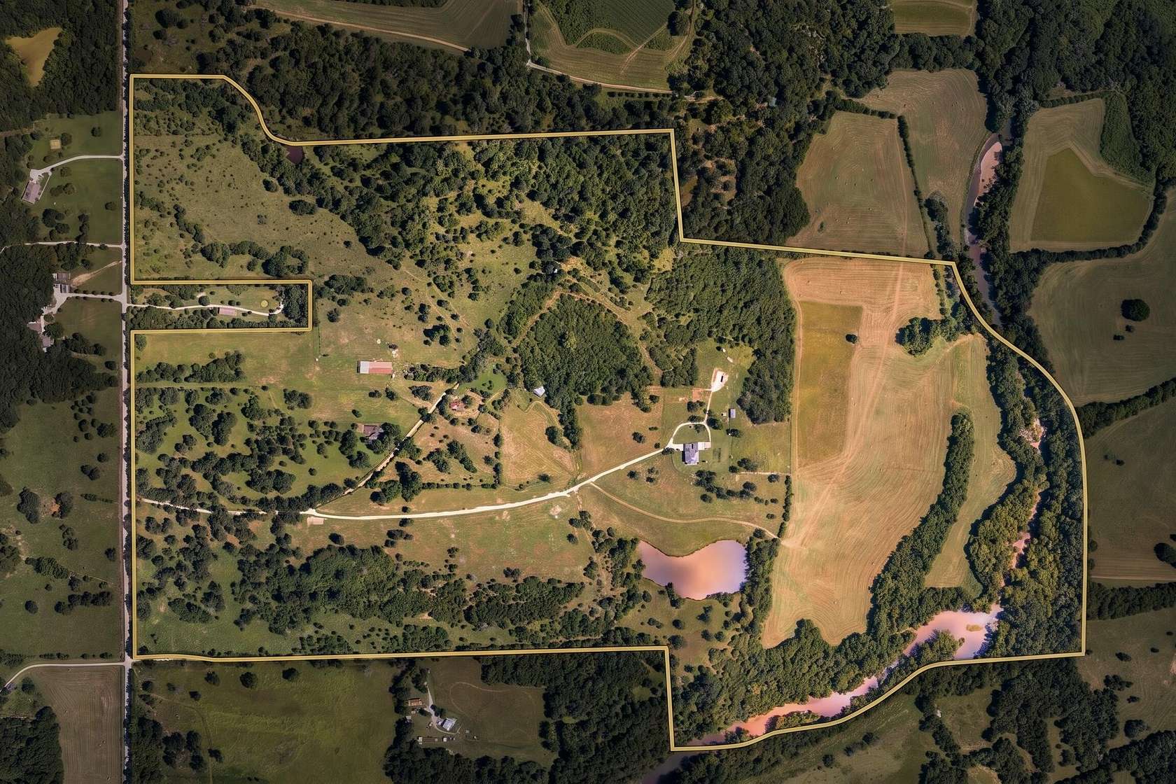 235 Acres of Recreational Land with Home for Sale in Willard, Missouri