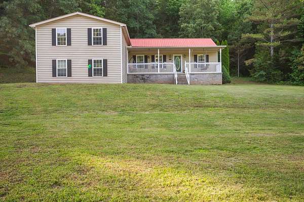 1.5 Acres of Land with Home for Sale in Cunningham, Tennessee