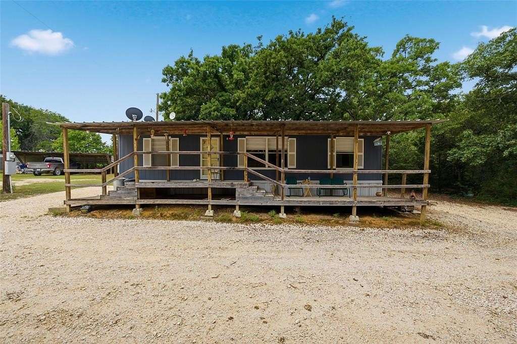 5 Acres of Land with Home for Sale in Blum, Texas