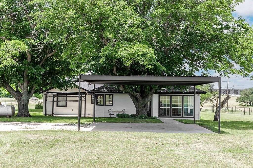 1.53 Acres of Land with Home for Sale in May, Texas