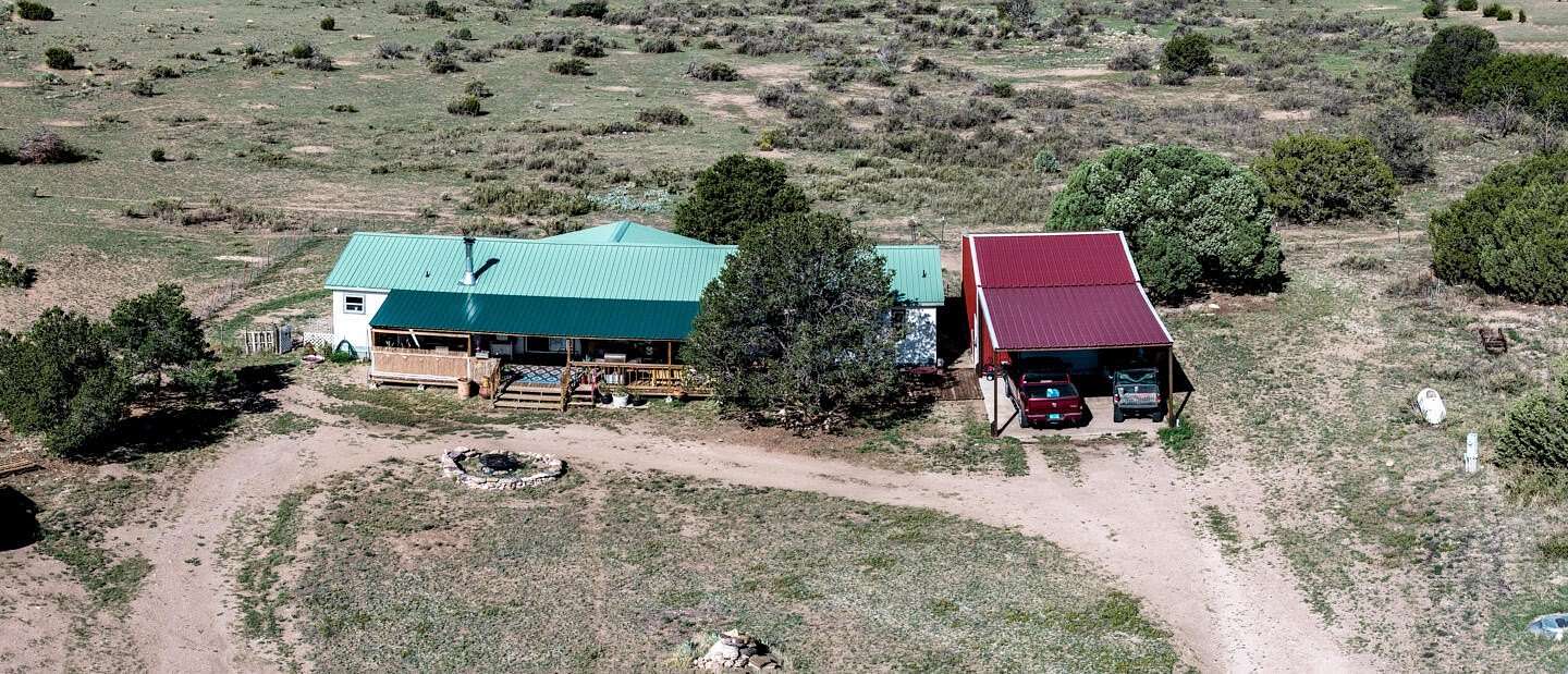 80 Acres of Agricultural Land with Home for Sale in Magdalena, New Mexico