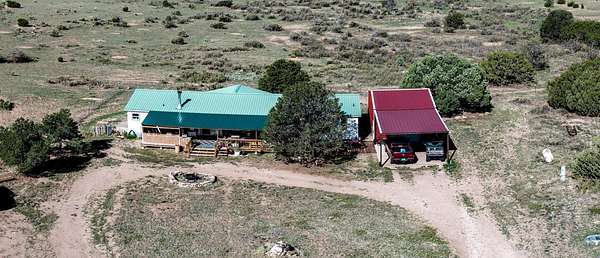 80 Acres of Agricultural Land with Home for Sale in Magdalena, New Mexico