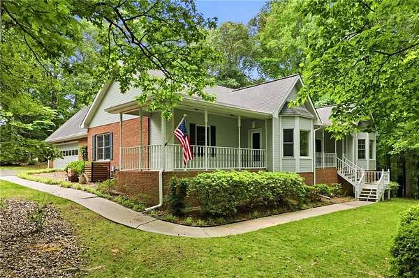 1.56 Acres of Land with Home for Sale in Sharpsburg, Georgia