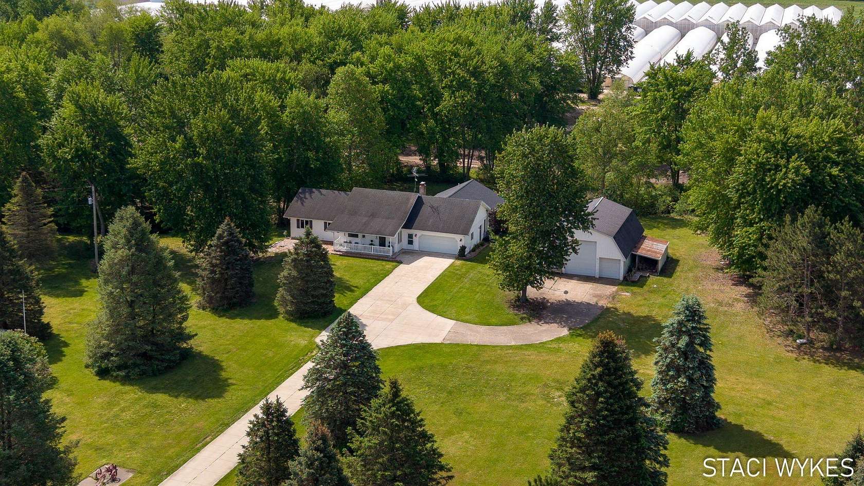 6.23 Acres of Land with Home for Sale in Byron Center, Michigan
